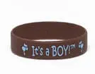 A brown bracelet with blue lettering and crosses.